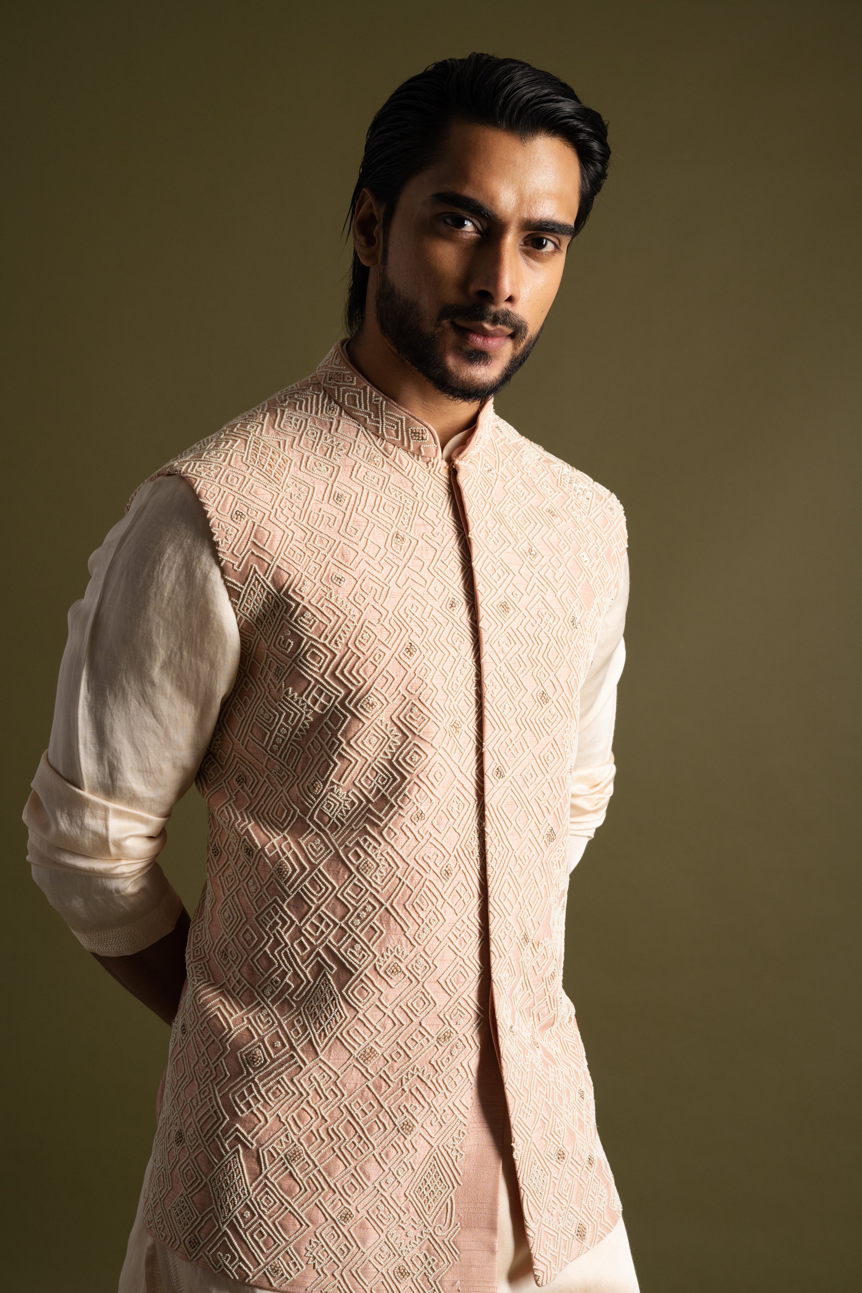PEACH SILK NEHRU WITH A TRIPLE LAYERED KURTA