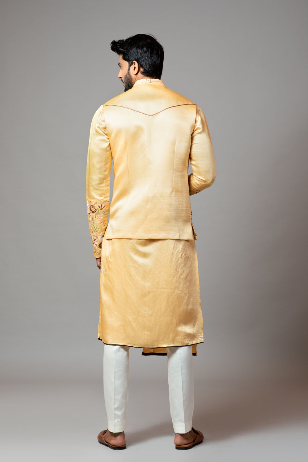 Mustard Nehru jacket highlighted with placement floral embroidery