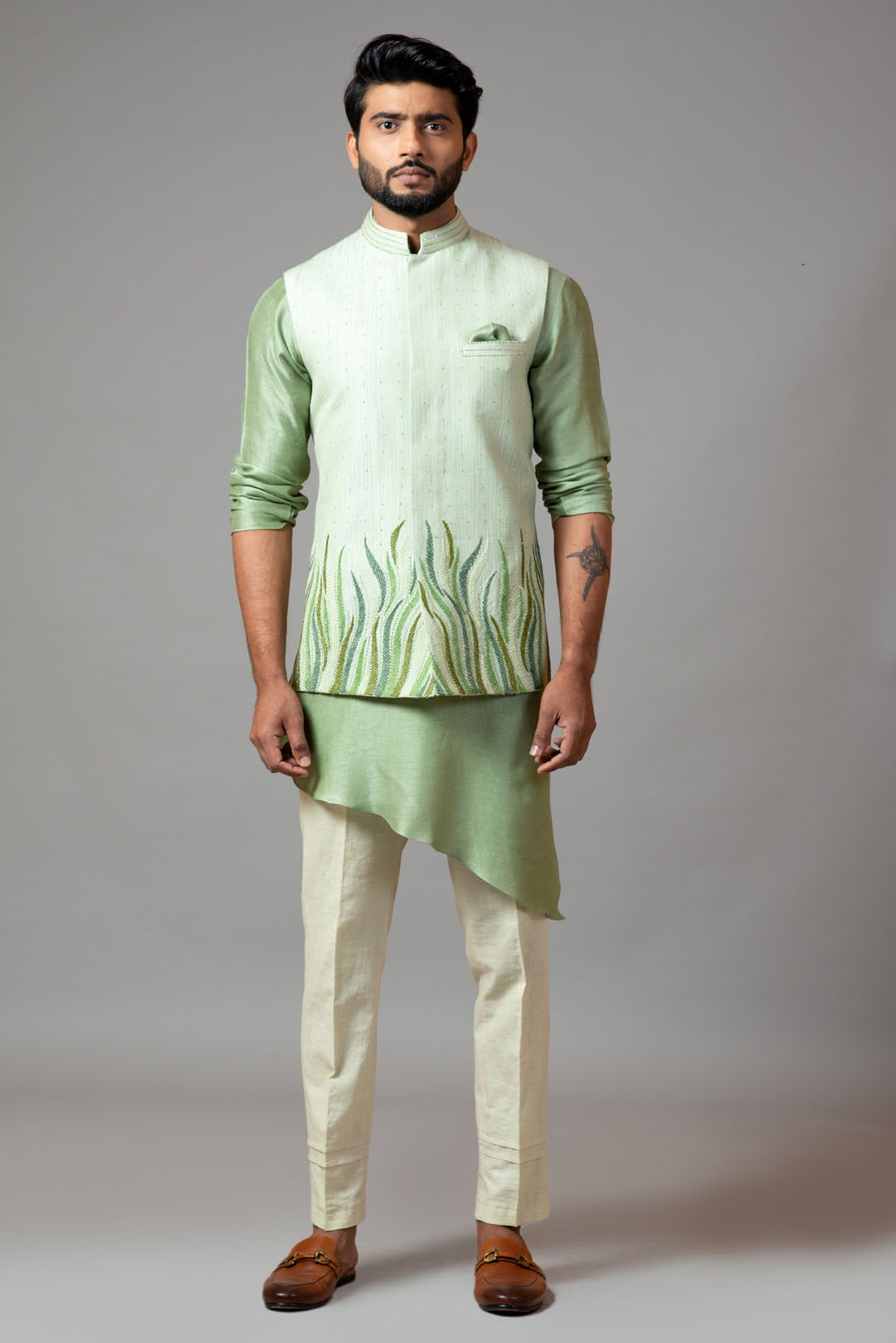 Stitchlines and embroidered nehru with assymetric kurta
