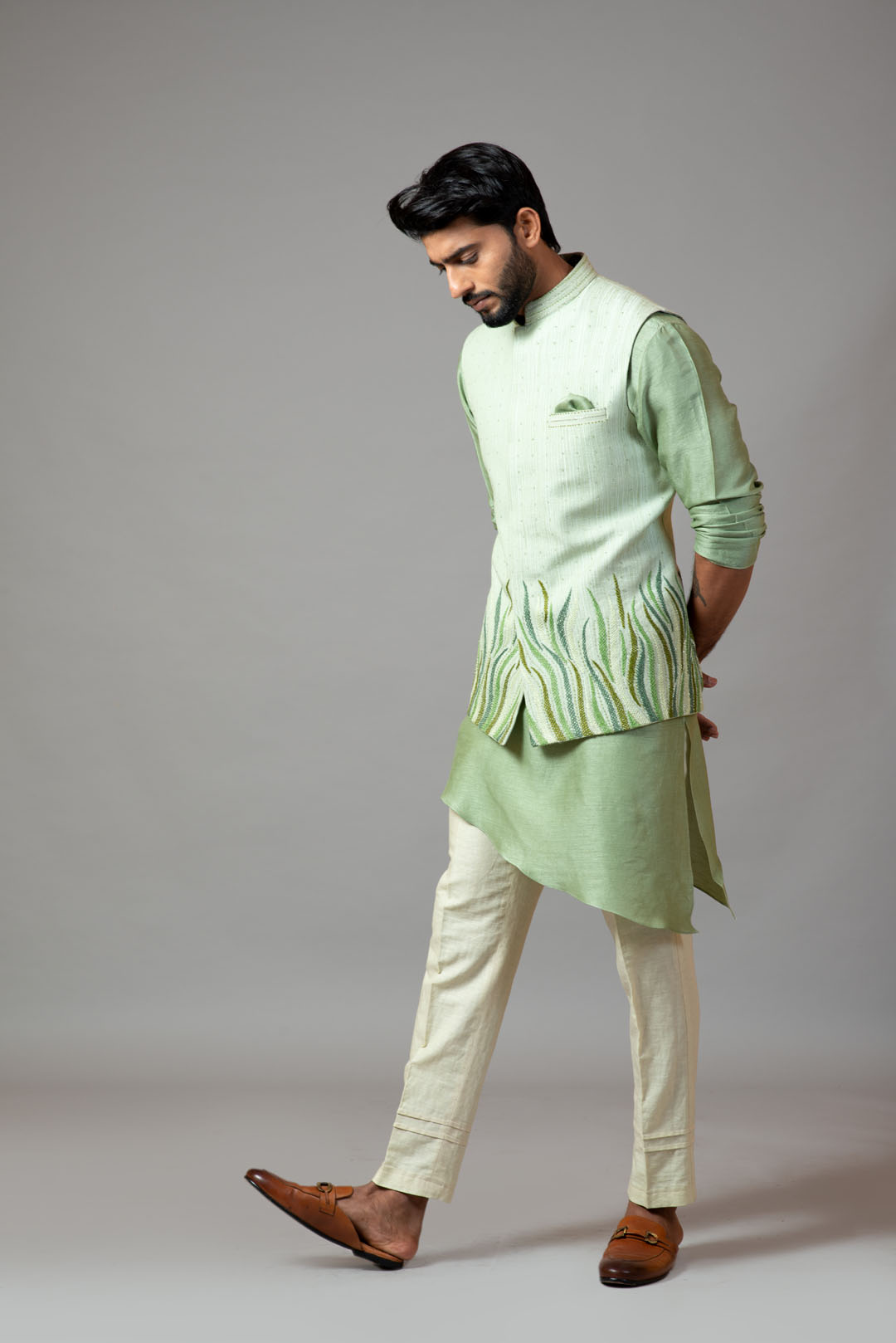 Stitchlines and embroidered nehru with assymetric kurta
