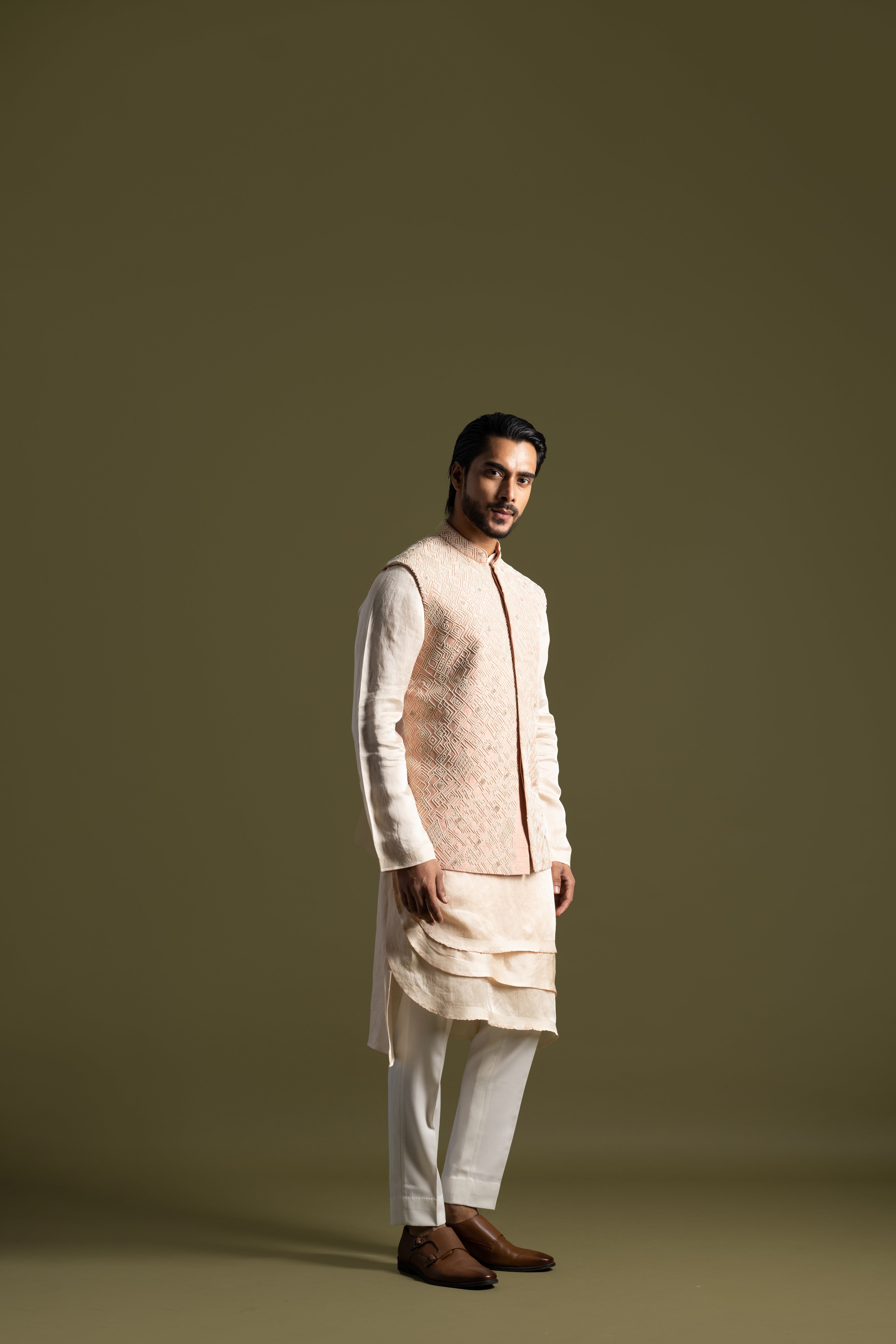 PEACH SILK NEHRU WITH A TRIPLE LAYERED KURTA