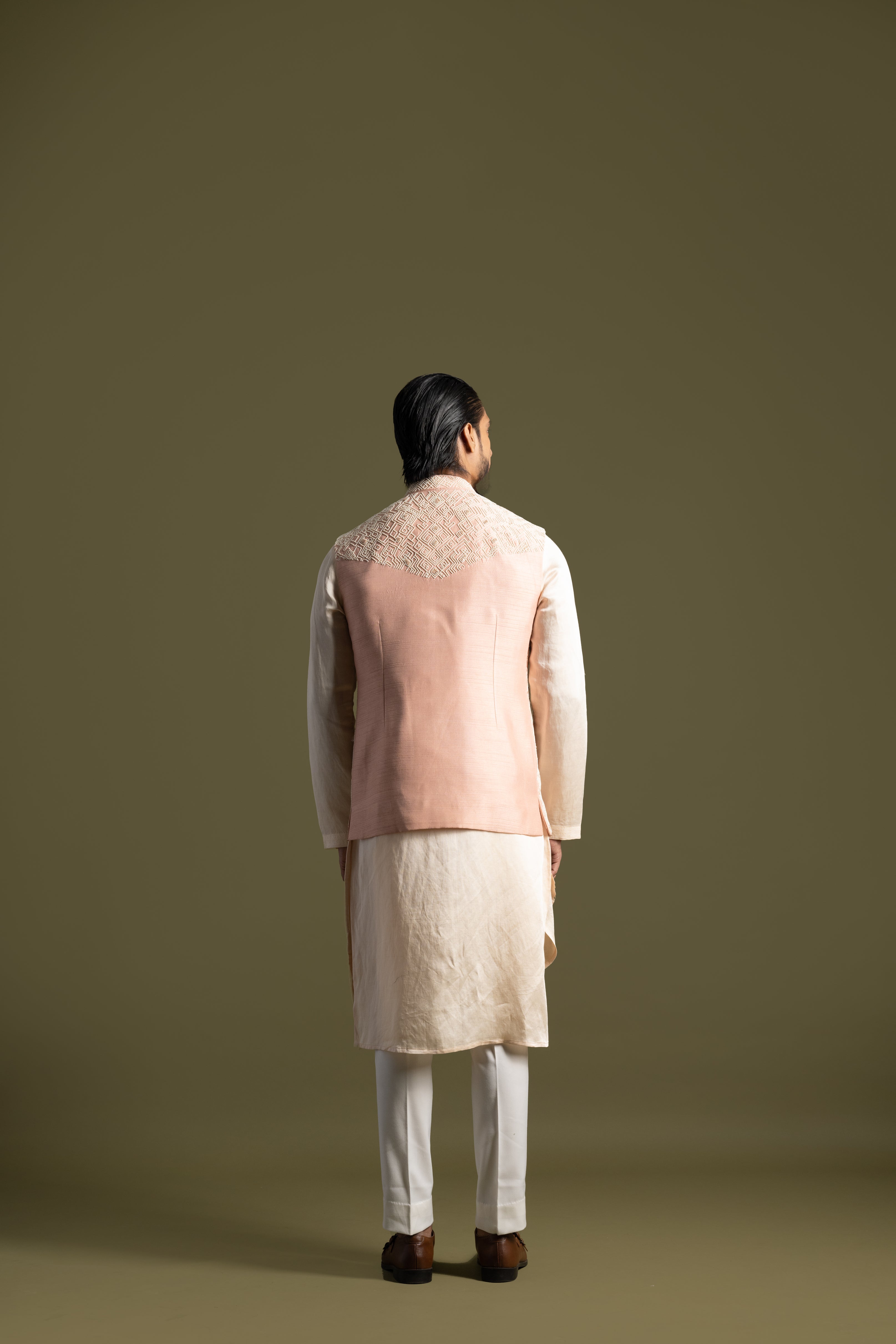 PEACH SILK NEHRU WITH A TRIPLE LAYERED KURTA