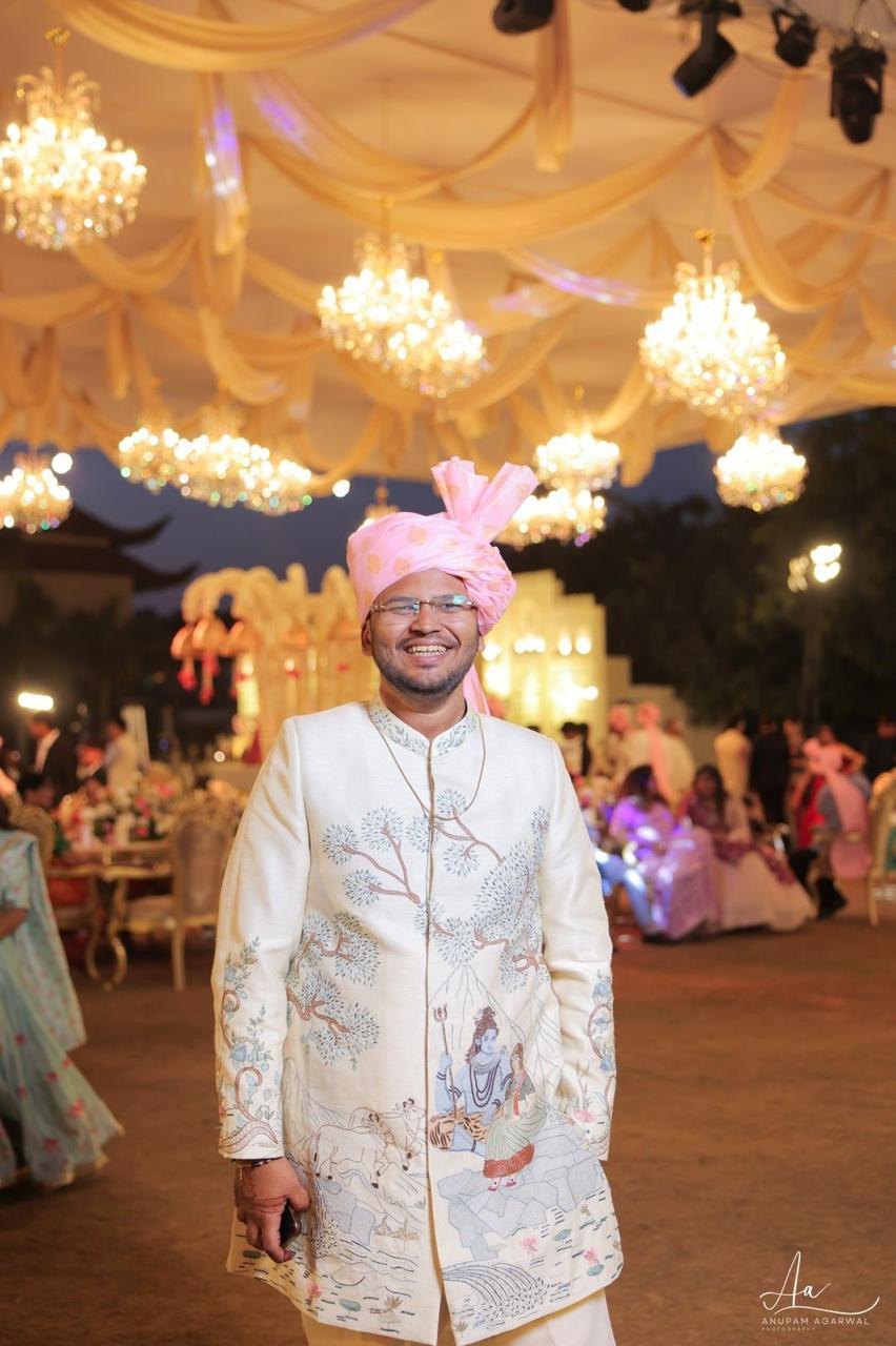 Paarsh client in a white embroidered sherwani