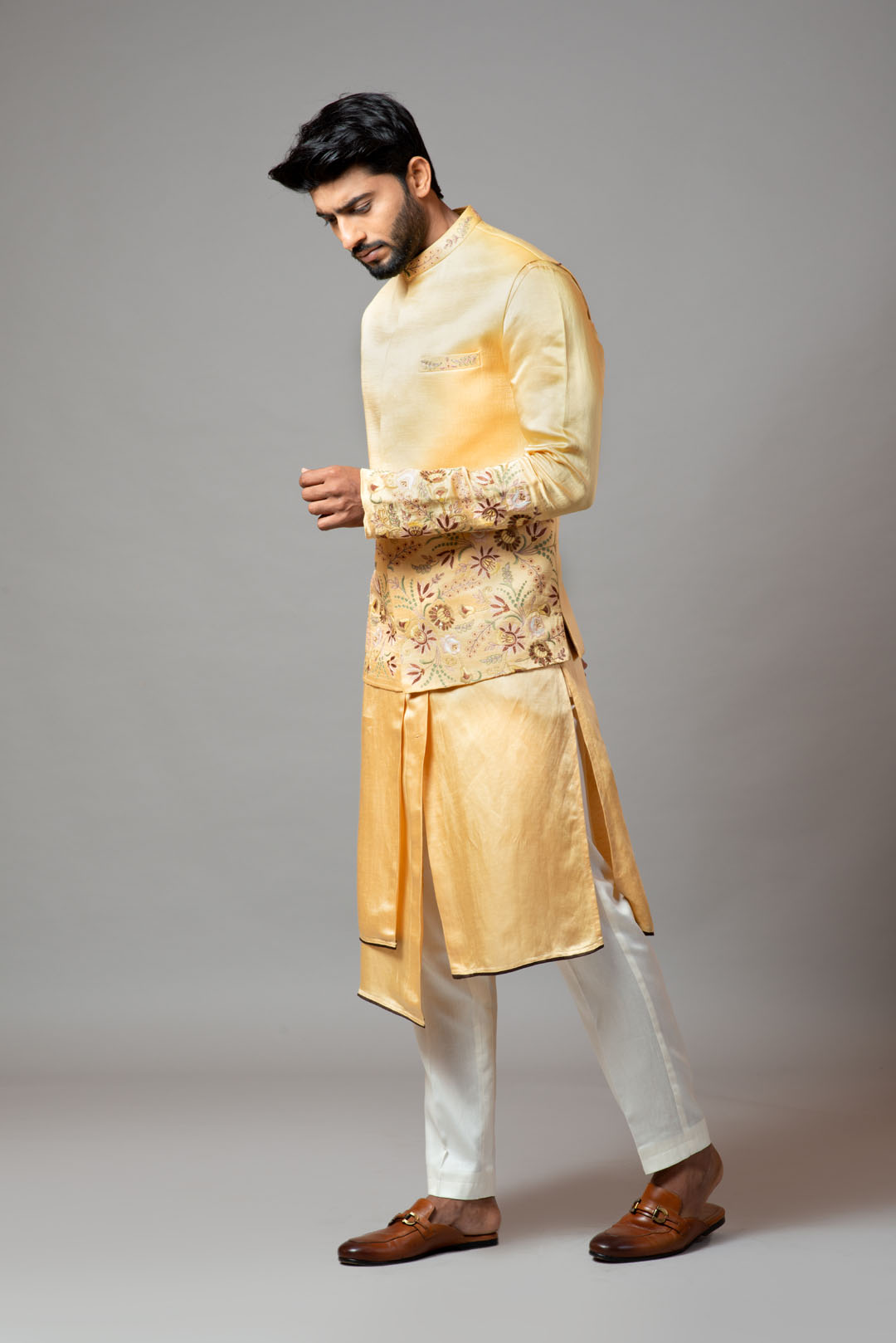 Mustard Nehru jacket Mustard Assymetric double panel kurta with embroidered sleeve and pant pajama